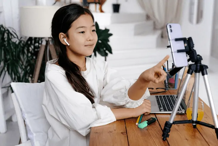 woman using airpods