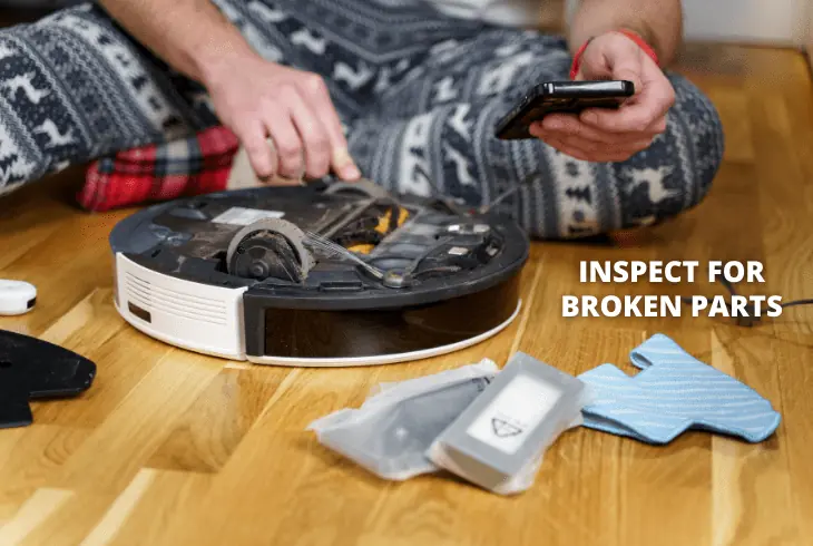 inspect robot vacuum for broken parts