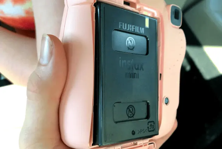 insert new film in the instax camera