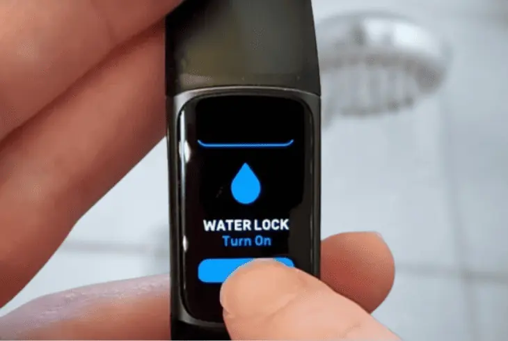 activating fitbit water feature lock