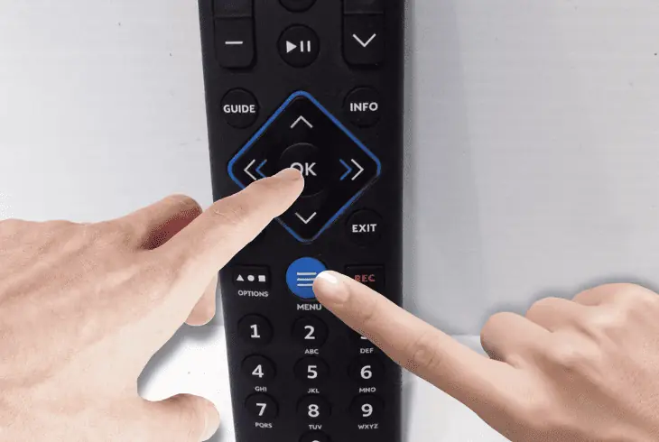 how to reprogram the spectrum guide remote